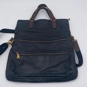 Fossil Black leather tote with Brown handles, gold accents and adjustable strap